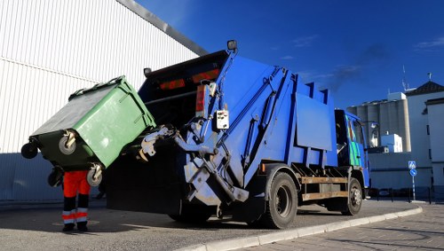 Professional garden clearance services in Edmonton performing vegetation removal